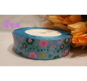 Атласная лента 25мм  с рисунком "Разноцветные цветы" на голубом фоне