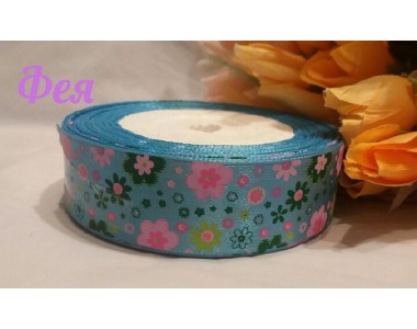 Атласная лента 25мм  с рисунком "Разноцветные цветы" на голубом фоне