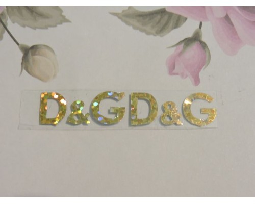 Термотрасферная наклейка "Dolce & Gabbana" голография, цв. золото 25*10 мм (пара)